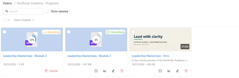 The video library: one video uploading at 33 percent, one converting, and a finished video with its cover, date and size.