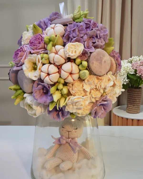 Edible flower arrangement in a vase