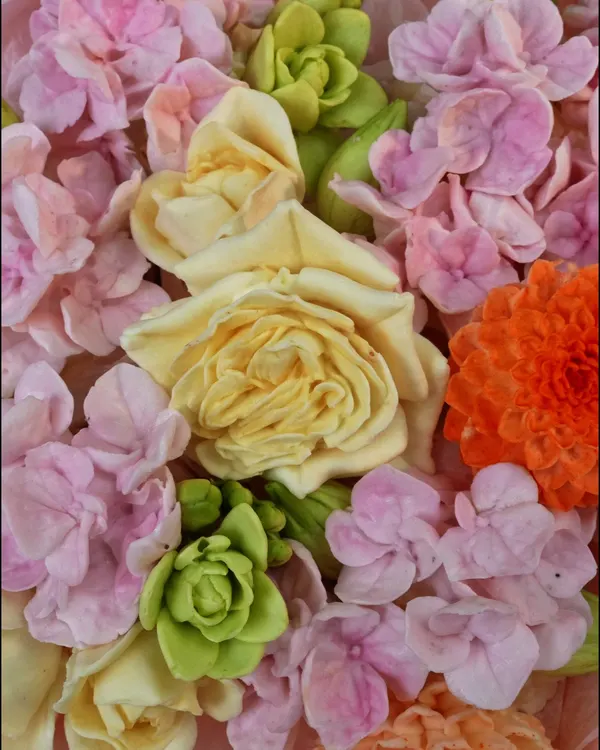 Pastel edible roses and succulents