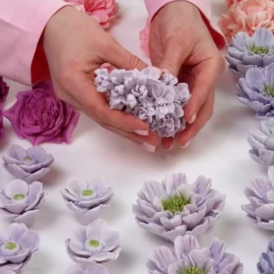 Molded edible flowers laid out on a table